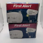 Pack Of 2 First Alert CO605B Carbon Monoxide Plug-in Alarm With Battery Backup Open. Price: $24.99.
